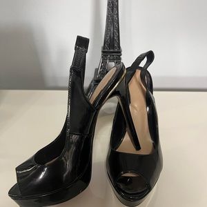 Aldo black high heels.